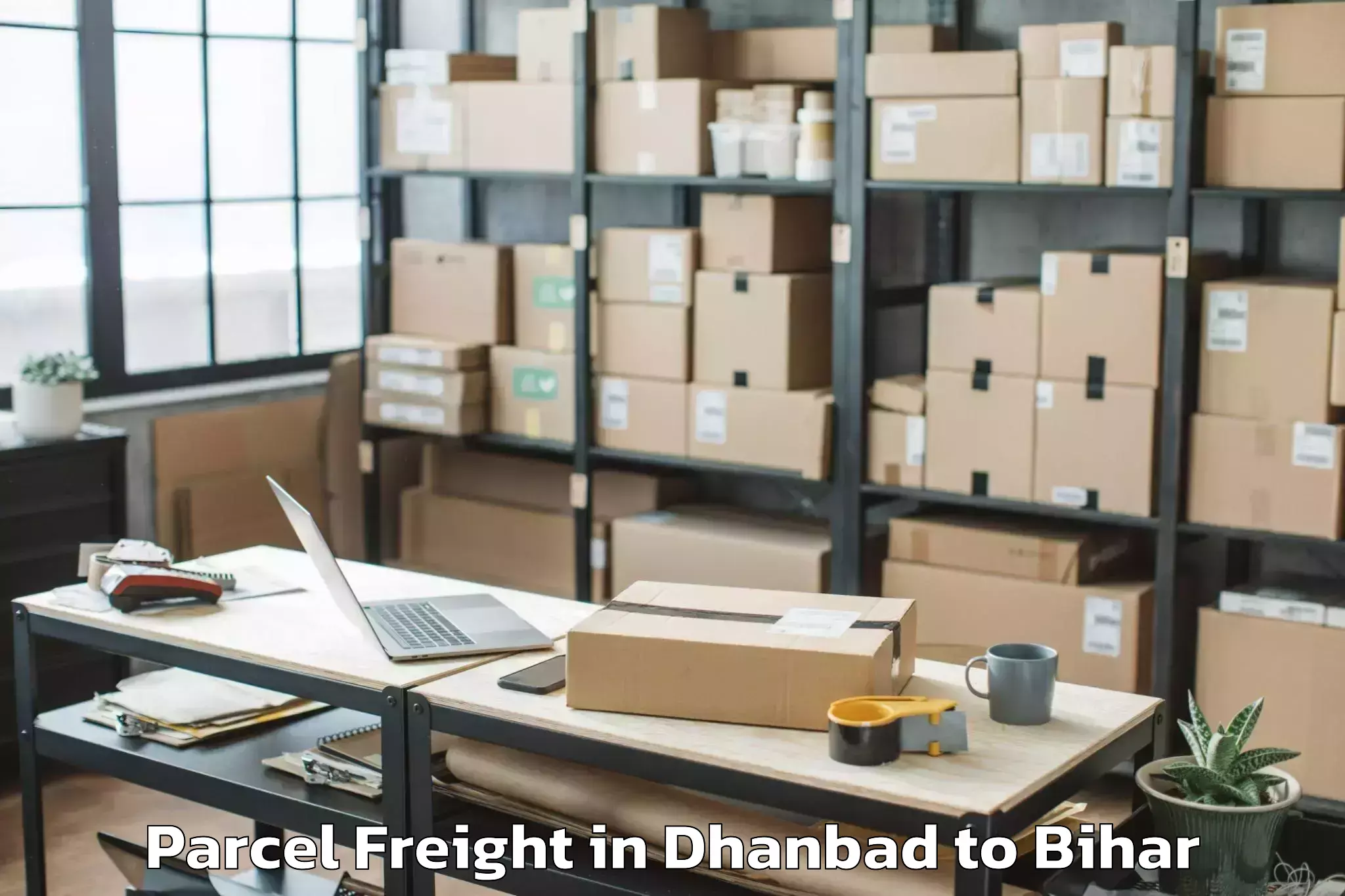 Leading Dhanbad to Makhdumpur Parcel Freight Provider